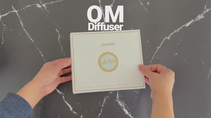 Om waterless diffuser with essential oil